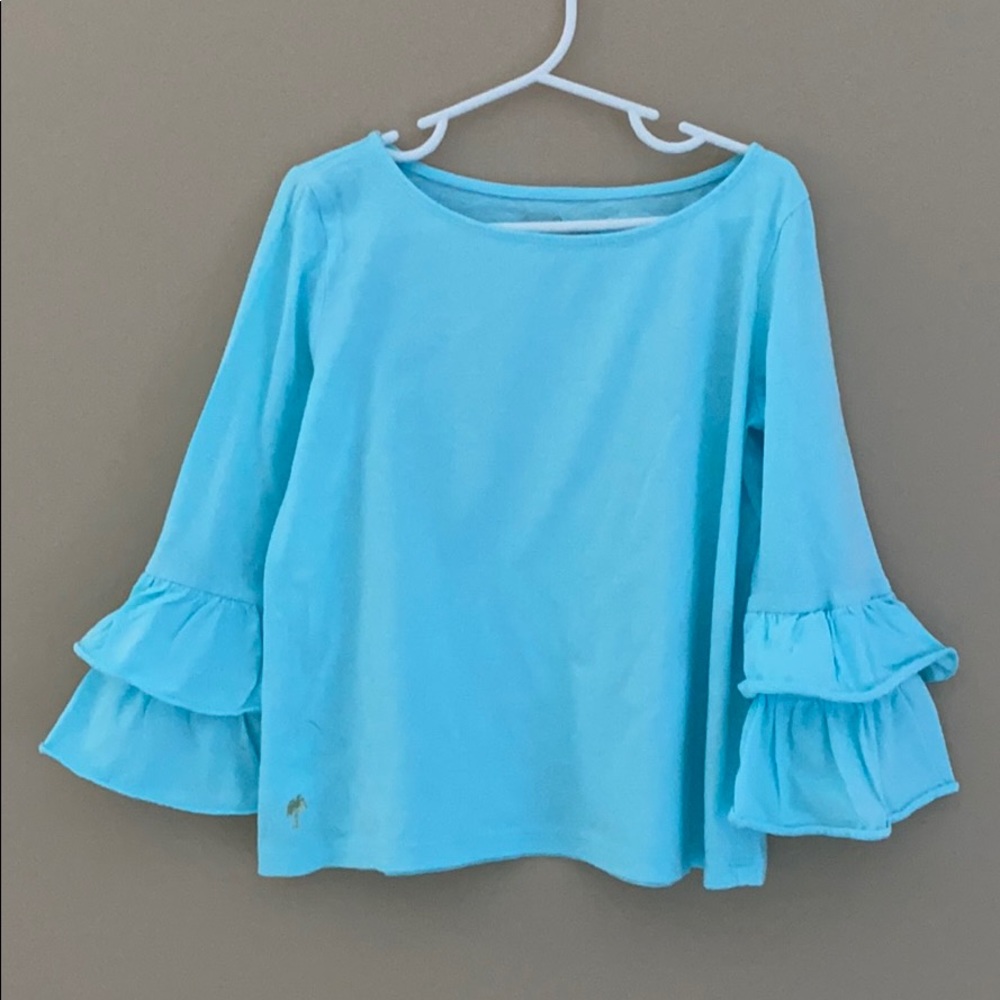 Lilly Pulitzer blue long sleeve top with ruffles.